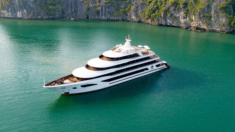 Sail through the stunning seascape of Ha Long Bay aboard a luxurious 5-star cruise, where world-class service meets unforgettable views